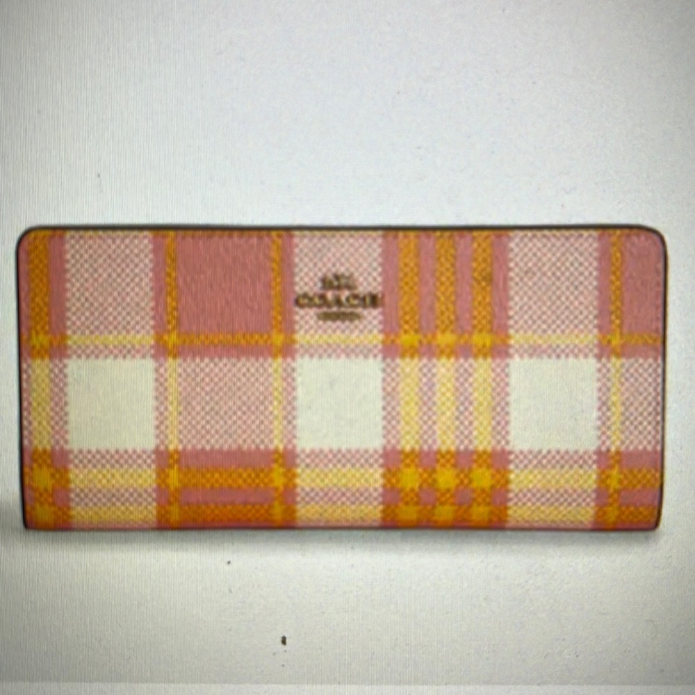 Coach Wallet with Gold hardware .  New With Tags & Tons of card holders …